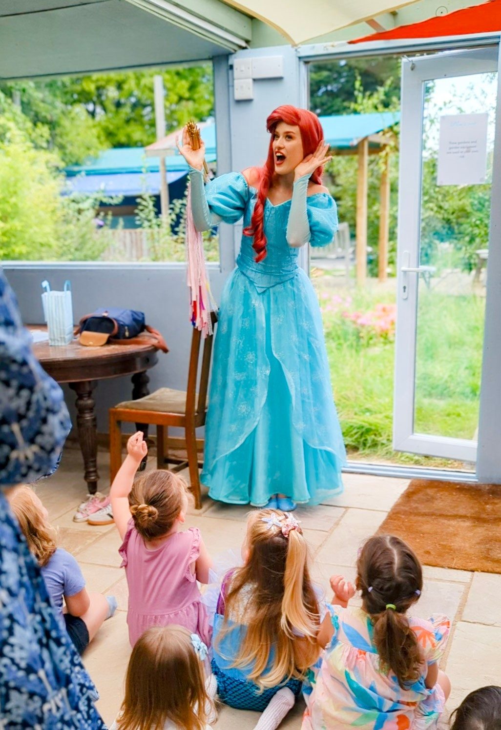 A character visit and story session at Hocus Pocus Play